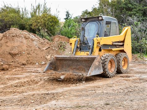 construction skid steer|skid steer construction vehicle.